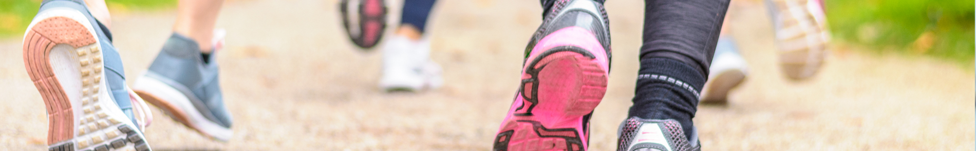Image of hands tieing shoe